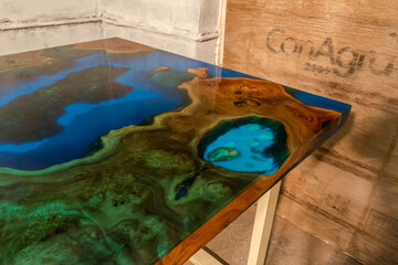 Fototapeta na wymiar beautiful wooden table made of elm slab and epoxy resin