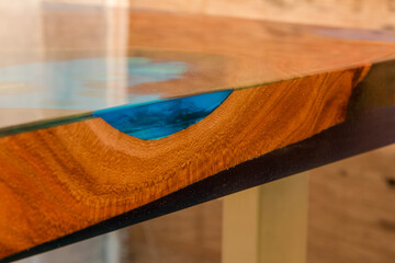 beautiful wooden table made of elm slab and epoxy resin