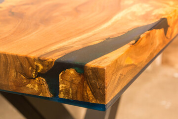 beautiful wooden table made of elm slab and epoxy resin