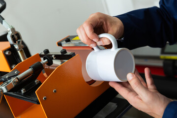 Machine for screen ceramic mug. Heat transfer machine. High quality photo