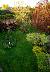 top view of the backyard garden with gazebo and lawn