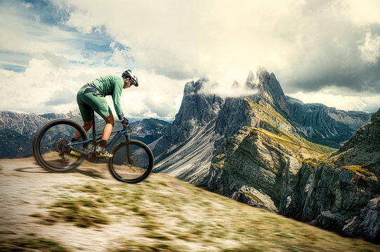 mountain biker in the mountains of the dolomites