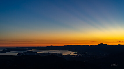 Sunset above city