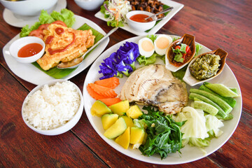 thai food top view asian food served on wooden table setting with plate menu in thailand