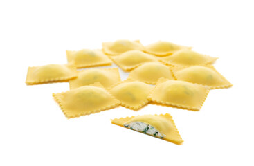 Fresh Ravioli pasta with ricotta cheese topping golden color isolated on white background, top view