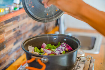 cooking vegetables in a pan