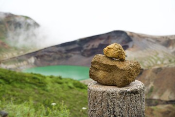 Stones on the stone at Japanese mountain.