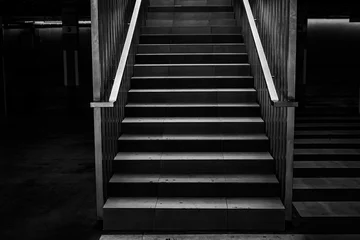 Foto op Canvas Moderne betonnen trappen met metalen leuningen © alipko
