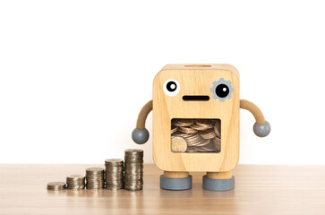 Savings coins  in the money box- Investment And Saving Concept