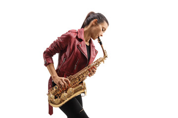 Young female musician in a leather jacket playing a saxophone