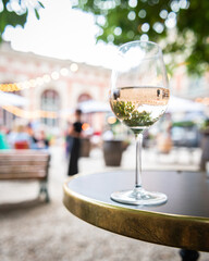 Rosé Wine on an outdoor terrace with string lights