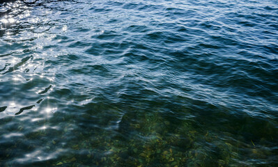 Sea surface as natural background, color toned.