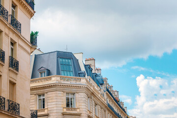 Antique building view in Paris city, France.