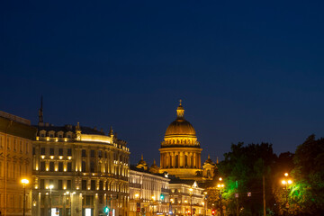 Fototapeta na wymiar Saint Isaac's Cathedral in St. Petersburg (Russia) at night. Illuminated dome of the cathedral