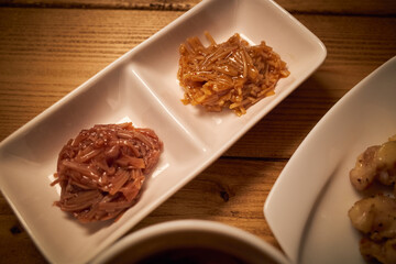 お酒のアテ（鶏なんこつ、ナムル、なめたけ）