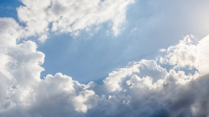 Scenic sky panorama background. Blue sky with fluffy white clouds