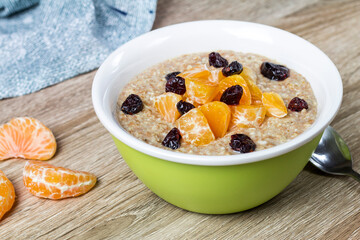 Oatmeal with dried cranberries and mandarin