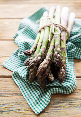 Asparagus  on old wooden  background.