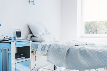 Hospital room with bed and comfortable medical equipped in modern hospital