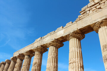Fototapeta premium Ancient temple's columns with sky in background