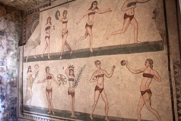 Mosaic wall of women running and playing sports