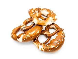 Drei knusprig-frische Brezen auf weißem Hintergrund