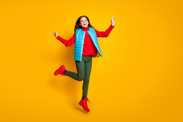 Fototapeta na wymiar Full body photo of excited carefree girl jump enjoy autumn fall weekend holiday wear red season clothes isolated over bright color background