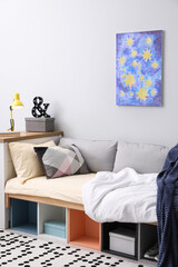 Modern teenager's room interior with comfortable bed and stylish design elements