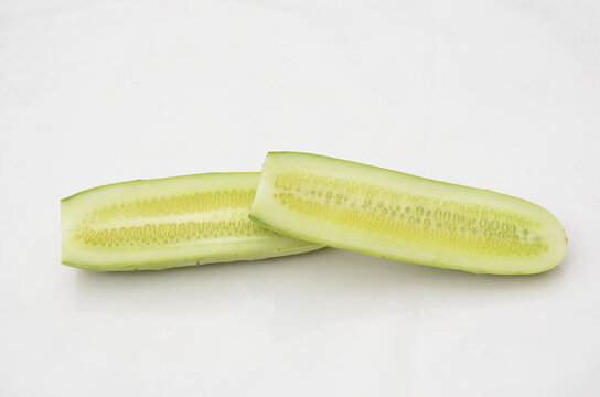 sliced cucumber isolated on white background.