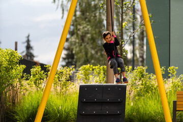Little girl rushes on a bungee