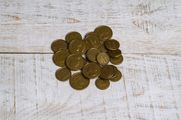 coins on wooden background
