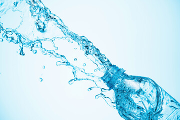 Water is poured out of a plastic bottle.