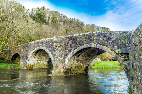 A view of the Llawhaden bridge, an eighteenth-century, grade 2 listed bridge that spans the River Cleddau, Wales