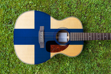 Norweigan  flag motif painted on wooden steel string acoustic guitar