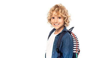 curly blonde schoolkid with backpack looking at camera isolated on white