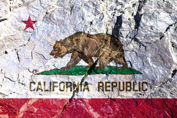 National flag of country America State of California against background of mountain wall with crack and faults on Independence Day painted brown bear on white. Political religious customs and delivery
