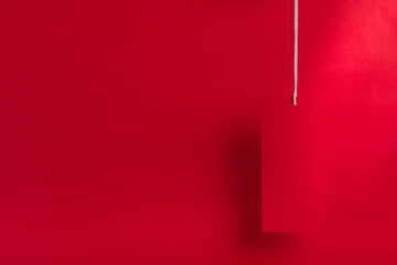 Black friday sale concept. Sale tag color on the red background with Copy space.