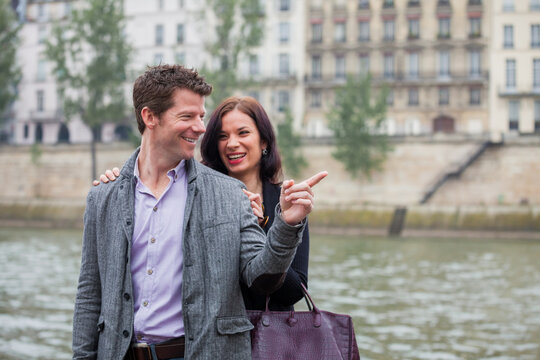 Couple on the banks of the Seine River