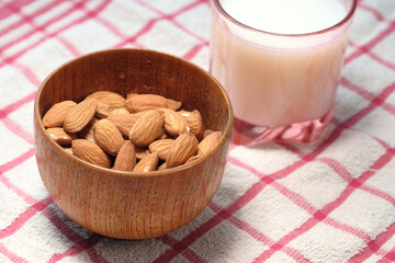  almond nut and milk on table cloth 