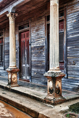 Facade of colorful colonial houses, Baracoa, Guantanamo province, Cuba.F