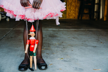 African-American Girl with a String Puppet