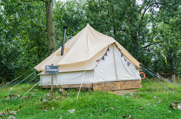 A fabric bell tent in the woods