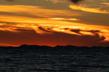 Colorful sunset at the Adriatic sea photographed in August 2020 in Zadar, Croatia
