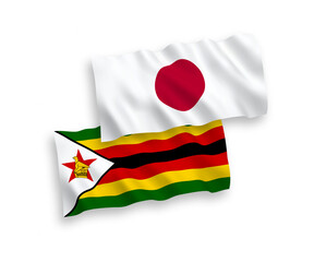 Flags of Japan and Zimbabwe on a white background
