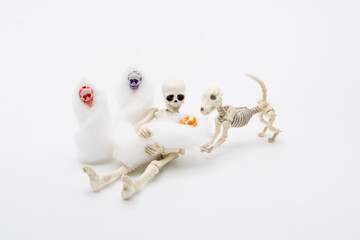 Skeleton mother with her children and a skeleton dog