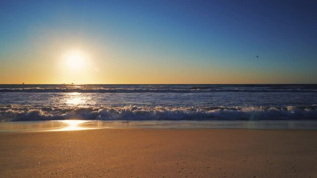 Sea sunrise over tropical island beach