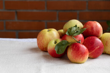there are ripe and juicy apples on the table