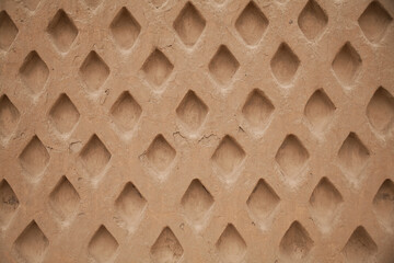 Lattice pattern background in adobe rendered wall