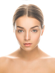 Fototapeta premium Studio shot of young attractive female wit clear shiny skin isolated on white background.