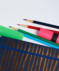 multicolored pencils on white background